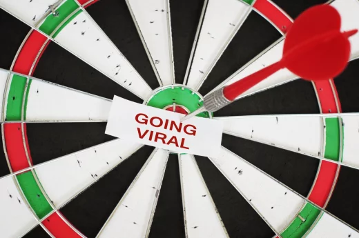 Going Viral Concept and a dart in center of target