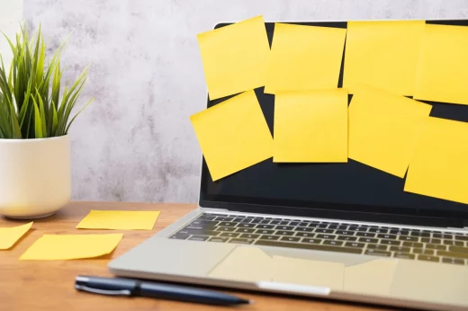 Yellow post note paper, memo paper on a screen laptop computer