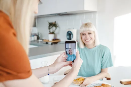 Girls taking videos on a smartphone